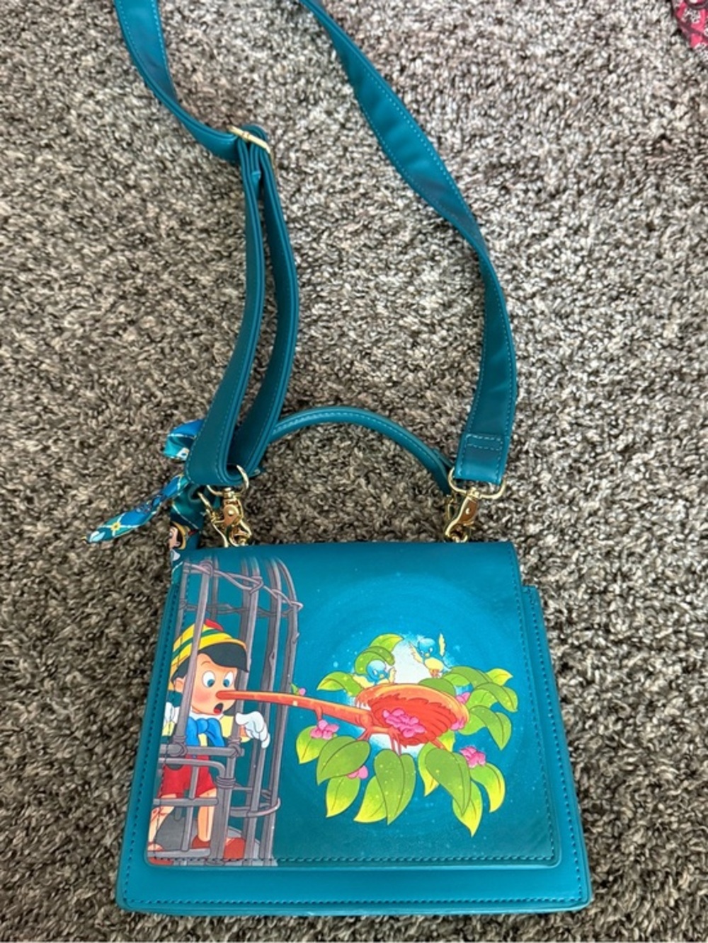 Loungefly Teal Pinocchio Illustration Crossbody Bag
